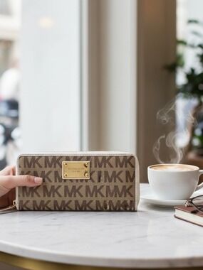 Michael Kors Brown and Tan MK Monogram Zip Wallet